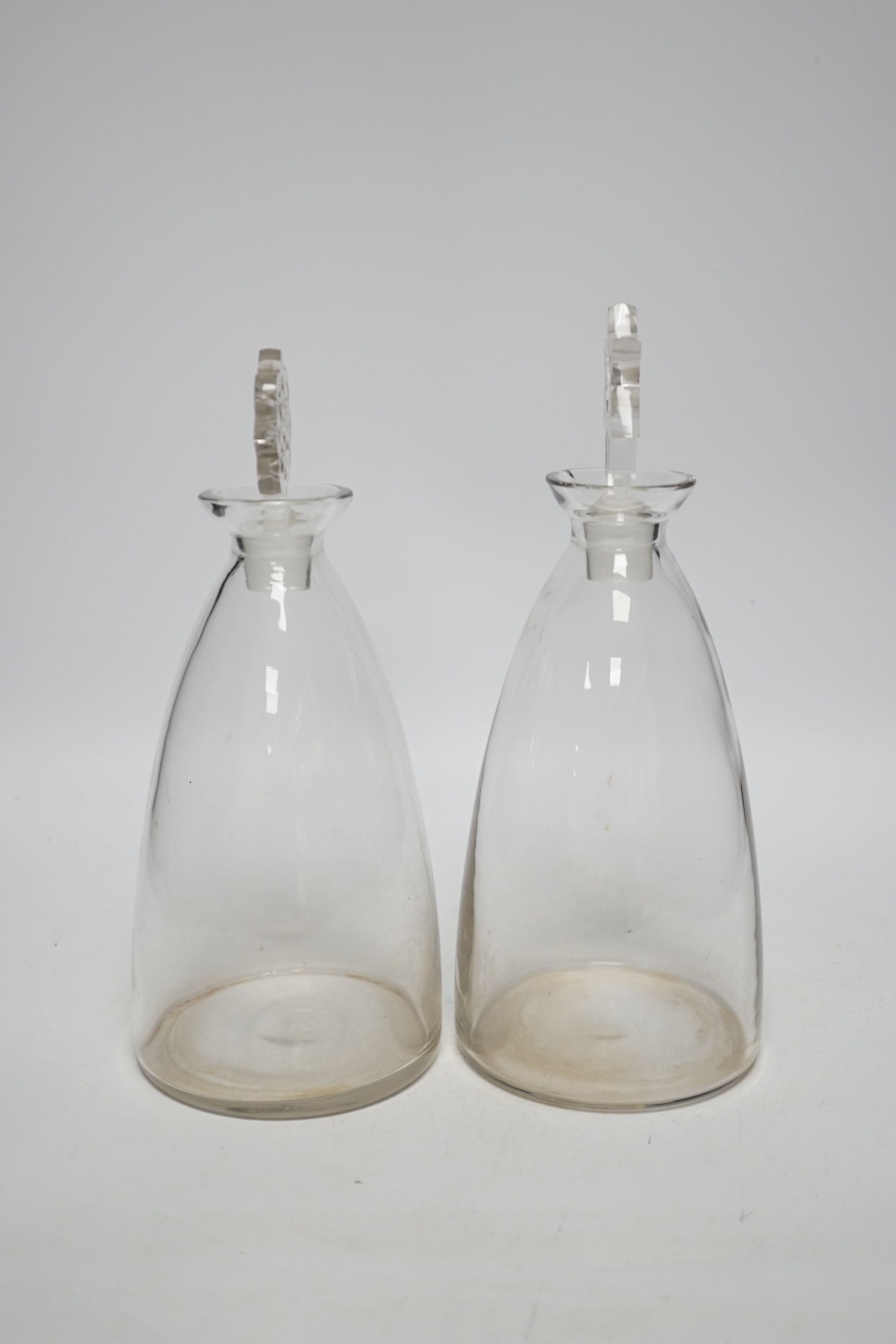 Two R. Lalique decanters, one with a Celtic knot stopper, the other the Star of David, tallest 27cm high (mark to base)